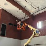 st john elementary gym construction lighting