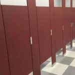 st john elementary gym construction bathroom stall installation